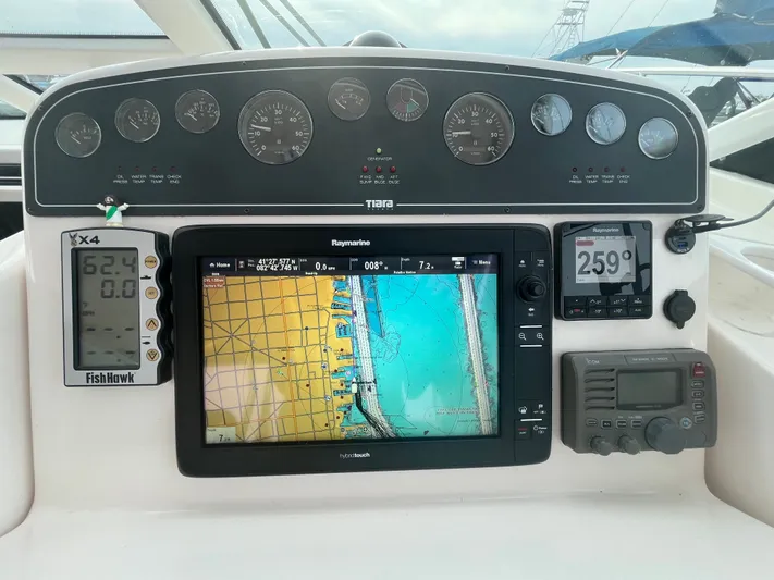 Papa Joe Yacht Photos Pics Dashboard of a 2006 Tiara Yachts 3600 Open with navigation and control instruments.