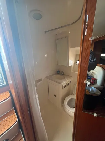 Papa Joe Yacht Photos Pics 2006 Tiara Yachts 3600 Open bathroom with sink, toilet, and mirror.