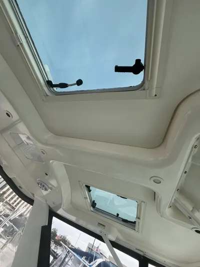 Papa Joe Yacht Photos Pics Interior view of 2006 Tiara Yachts 3600 Open, featuring skylights and sleek design.