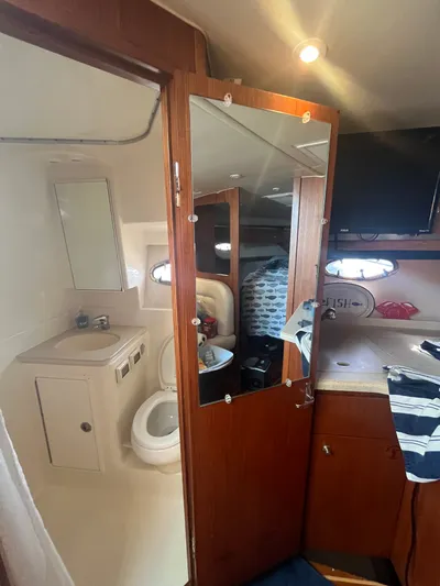 Papa Joe Yacht Photos Pics 2006 Tiara Yachts 3600 Open interior with bathroom and cabin view.