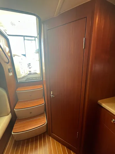 Papa Joe Yacht Photos Pics Interior of 2006 Tiara Yachts 3600 Open, featuring wooden steps and cabinetry.