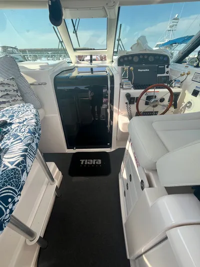 Papa Joe Yacht Photos Pics 2006 Tiara Yachts 3600 Open cockpit with steering wheel and navigation equipment.