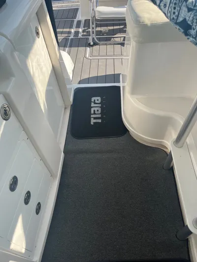 Papa Joe Yacht Photos Pics Interior view of a 2006 Tiara Yachts 3600 Open, featuring sleek design and seating.