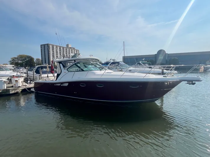 Papa Joe Yacht Photos Pics 2006 Tiara Yachts 3600 Open docked in a marina under a clear blue sky.