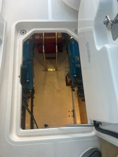 Papa Joe Yacht Photos Pics Engine compartment of a 2006 Tiara Yachts 3600 Open, showcasing dual engines.