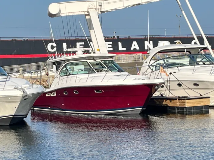 Papa Joe Yacht Photos Pics 2006 Tiara Yachts 3600 Open docked in Cleveland marina, featuring a sleek red hull.