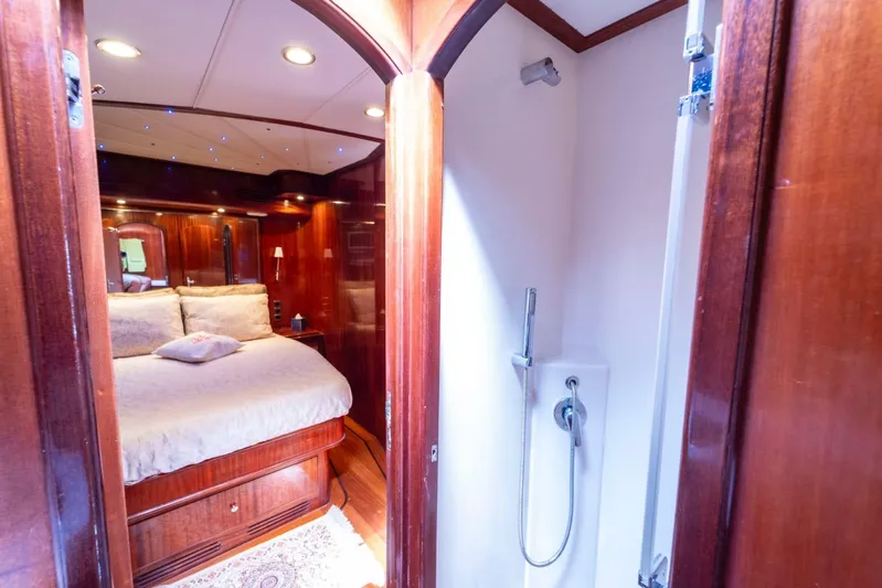  Yacht Photos Pics Luxurious cabin interior of 2006 Vicem 54 Classic Flybridge yacht with wood finishes.