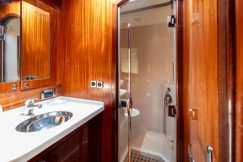  Yacht Photos Pics Luxurious wooden bathroom interior on a 2006 Vicem 54 Classic Flybridge yacht.
