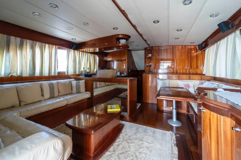  Yacht Photos Pics Luxurious interior of 2006 Vicem 54 Classic Flybridge yacht with elegant wood finishes.