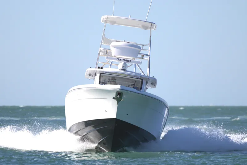 New! Hybrid Design Yacht Photos Pics 2025 Century NAV4100 CC-H boat cruising on open water.