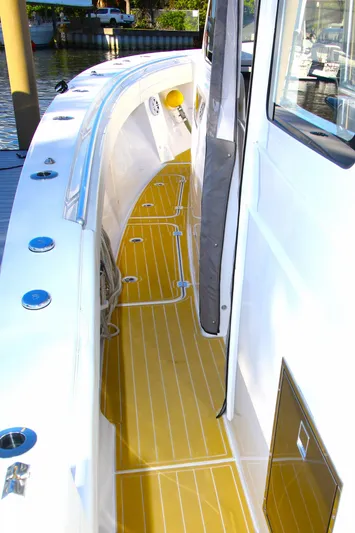 New! Hybrid Design Yacht Photos Pics Century NAV4100 CC-H (Twins) 2025 boat with sleek deck design and modern features.