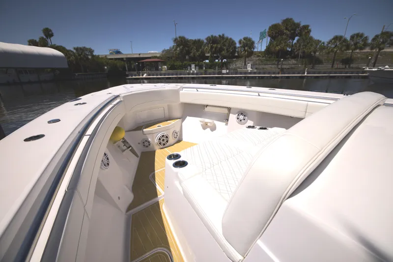 New! Hybrid Design Yacht Photos Pics 2025 Century NAV4100 CC-H boat interior with white seating and speakers.