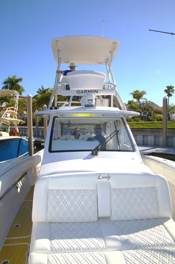 New! Hybrid Design Yacht Photos Pics 2025 Century NAV4100 CC-H boat docked under clear blue sky.