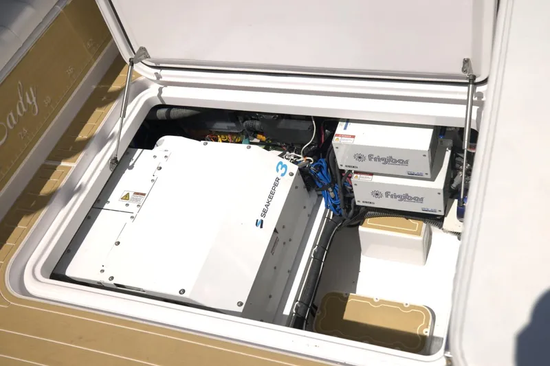 New! Hybrid Design Yacht Photos Pics 2025 Century NAV4100 CC-H boat engine compartment with SeaKeeper and Firefly components.