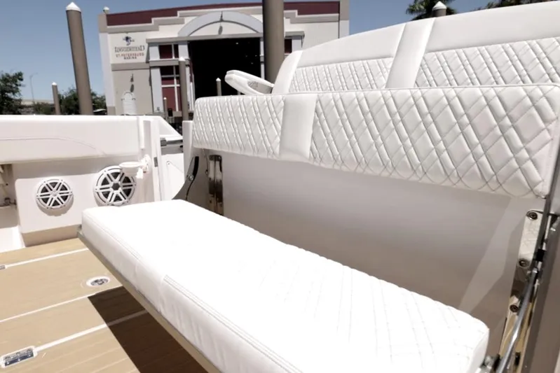 New! Hybrid Design Yacht Photos Pics 2025 Century NAV4100 CC-H boat with white quilted seating and modern design.