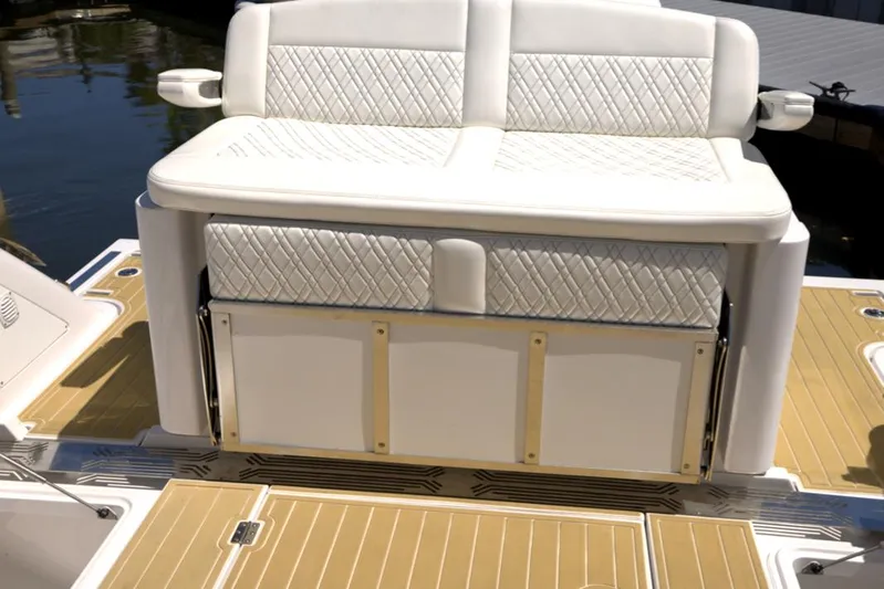 New! Hybrid Design Yacht Photos Pics Luxury seating on 2025 Century NAV4100 CC-H boat, featuring elegant white upholstery.