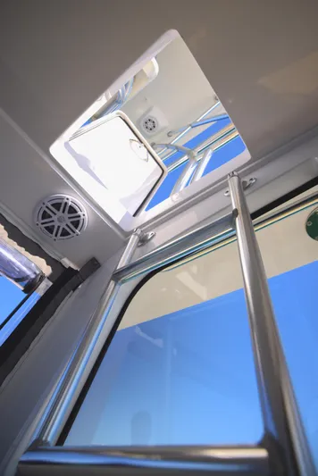New! Hybrid Design Yacht Photos Pics Interior view of 2025 Century NAV4100 CC-H boat, showing hatch and ladder.