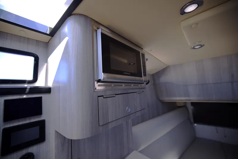New! Hybrid Design Yacht Photos Pics Interior of 2025 Century NAV4100 CC-H boat with modern kitchen amenities.