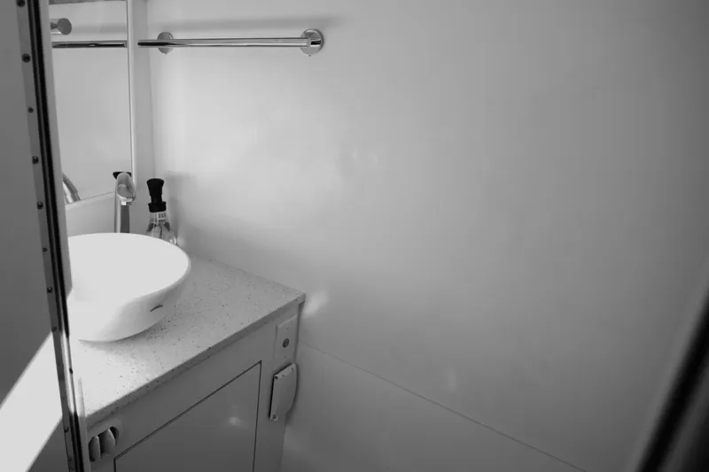 New! Hybrid Design Yacht Photos Pics Modern bathroom in Century NAV4100 CC-H (Twins) 2025, featuring sleek sink and minimalist design.