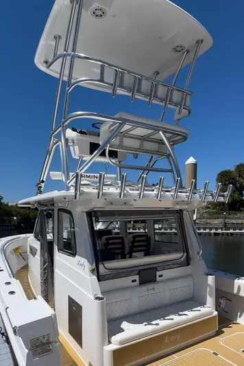 New! Hybrid Design Yacht Photos Pics 2025 Century NAV4100 CC-H boat with twin engines, featuring a sleek design and spacious deck.