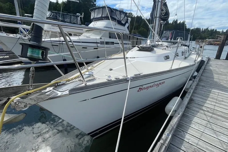 "snapdragon" Yacht Photos Pics Sailboat docked at marina, Tartan 4100 model, year 1999, named Snapdragon.