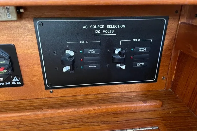 "snapdragon" Yacht Photos Pics AC source selection panel on a 1999 Tartan 4100 boat, featuring 120 volts options.