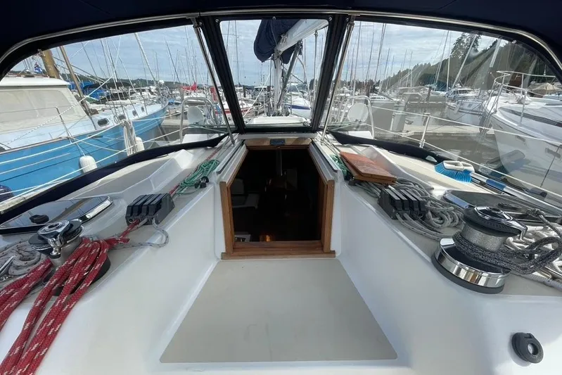 "snapdragon" Yacht Photos Pics Cockpit view of a 1999 Tartan 4100 sailboat docked at a marina.