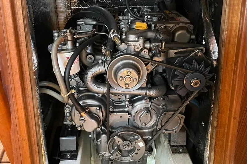 "snapdragon" Yacht Photos Pics Engine of a 1999 Tartan 4100 sailboat, showcasing mechanical components and belts.