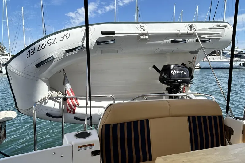 C-worthy III Yacht Photos Pics 2014 Cutwater C-30 SC LE with dinghy and Tohatsu motor in marina setting.