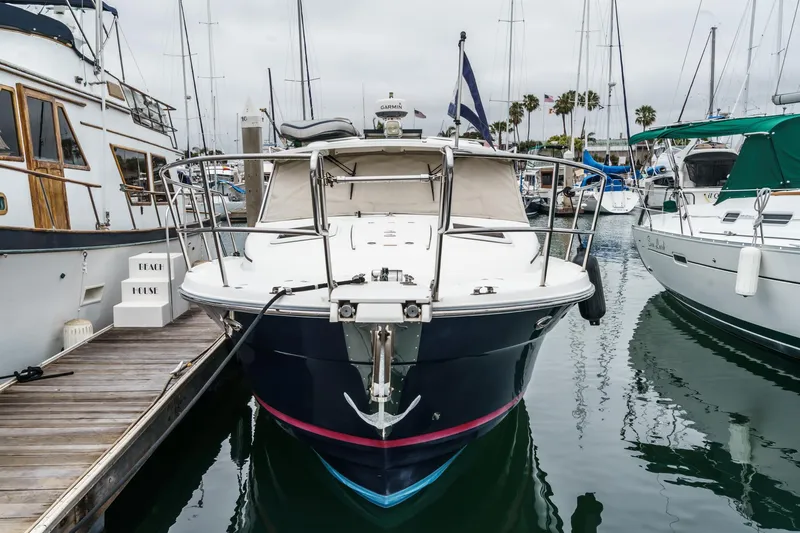 C-worthy III Yacht Photos Pics 2014 Cutwater C-30 SC LE boat docked in a marina, surrounded by other vessels.