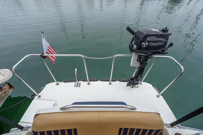 C-worthy III Yacht Photos Pics 2014 Cutwater C-30 SC LE boat stern with Tohatsu motor and American flag.