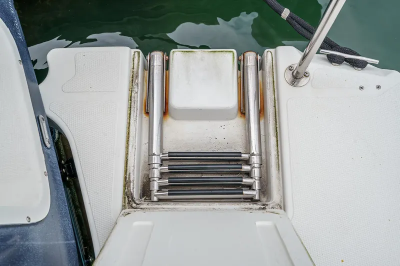 C-worthy III Yacht Photos Pics Swim platform with ladder on 2014 Cutwater C-30 SC LE boat.
