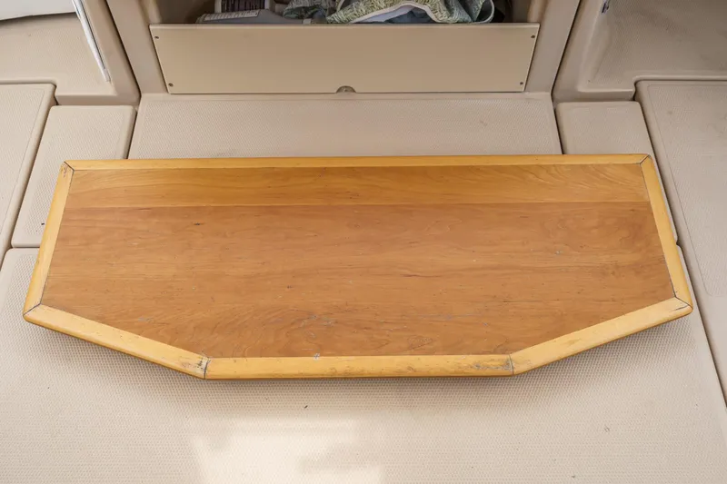 C-worthy III Yacht Photos Pics Wooden table on a 2014 Cutwater C-30 SC LE boat deck.