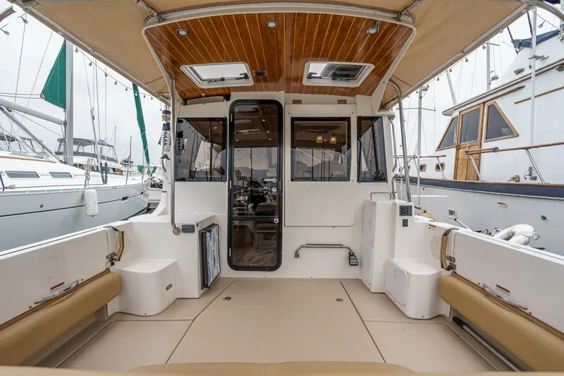 C-worthy III Yacht Photos Pics 2014 Cutwater C-30 SC LE boat interior with spacious seating and wood-accented ceiling.