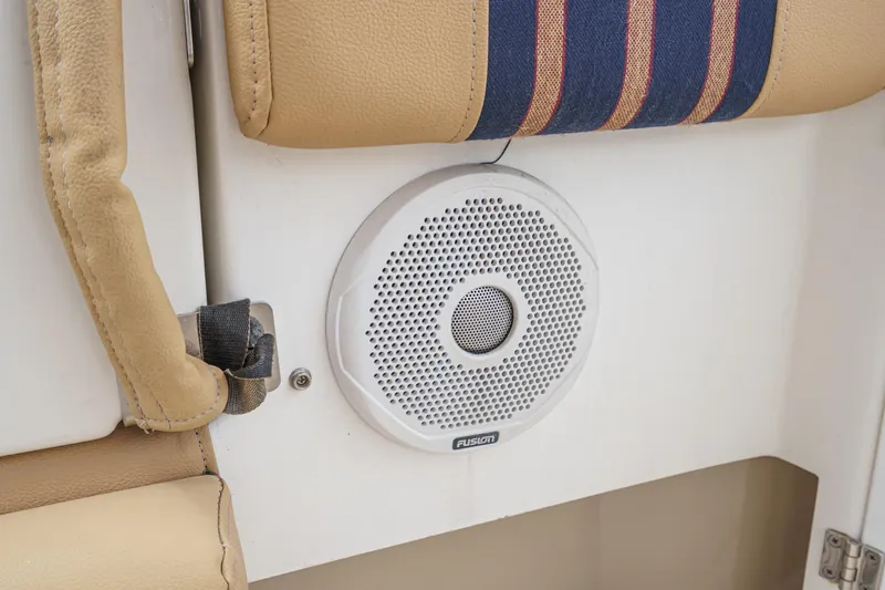 C-worthy III Yacht Photos Pics Speaker on 2014 Cutwater C-30 SC LE boat, beige and blue interior.