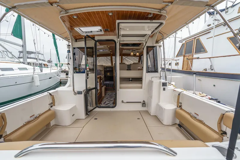 C-worthy III Yacht Photos Pics 2014 Cutwater C-30 SC LE boat interior with seating and open cabin view.