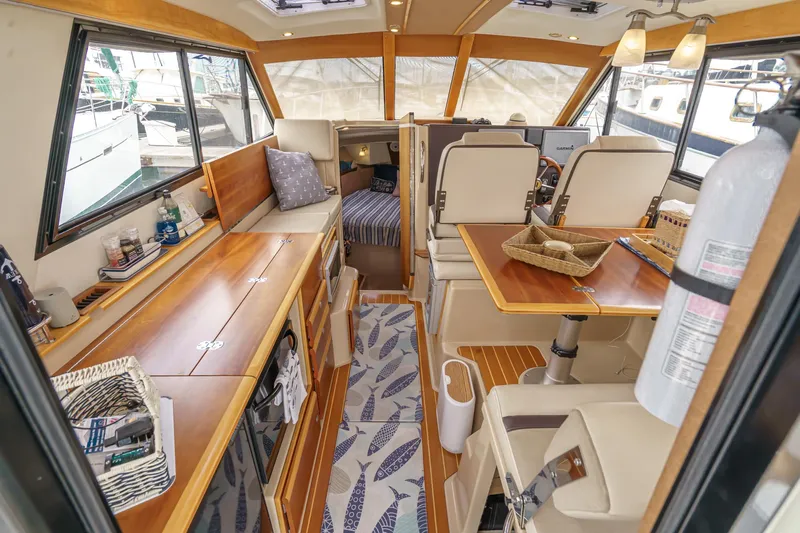 C-worthy III Yacht Photos Pics Luxurious 2014 Cutwater C-30 SC LE yacht interior with wood finishes and modern amenities.