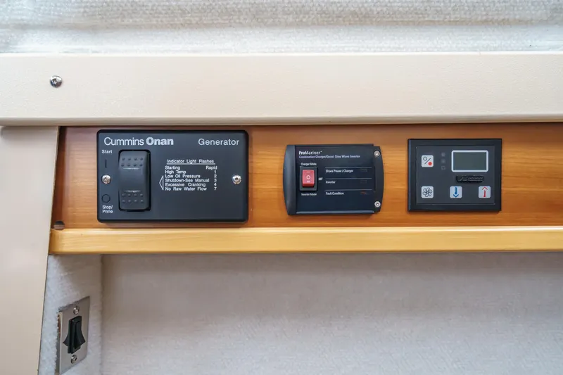 C-worthy III Yacht Photos Pics Control panel of a 2014 Cutwater C-30 SC LE boat featuring Cummins Onan generator.