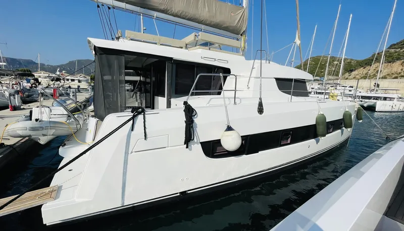 Yacht Photos Pics Bali 4.4 catamaran docked at marina, 2022 model, with clear blue sky background.