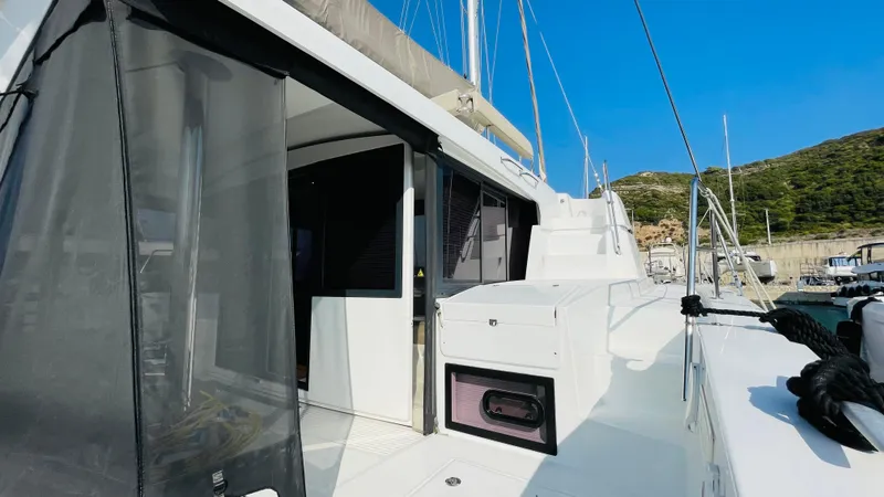  Yacht Photos Pics 2022 Bali 4.4 yacht docked at marina, featuring sleek design and modern amenities.