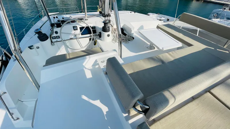  Yacht Photos Pics Luxurious Bali 4.4 yacht deck with steering wheel and seating, 2022 model.