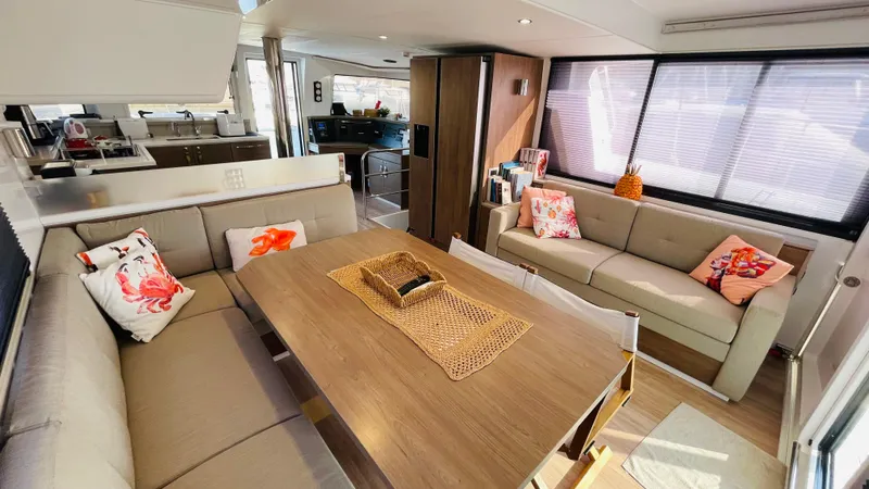  Yacht Photos Pics Luxurious interior of 2022 Bali 4.4 yacht with modern seating and decor.