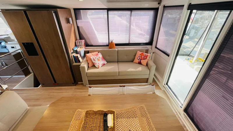  Yacht Photos Pics Modern interior of 2022 Bali 4.4 yacht with cozy seating and stylish decor.