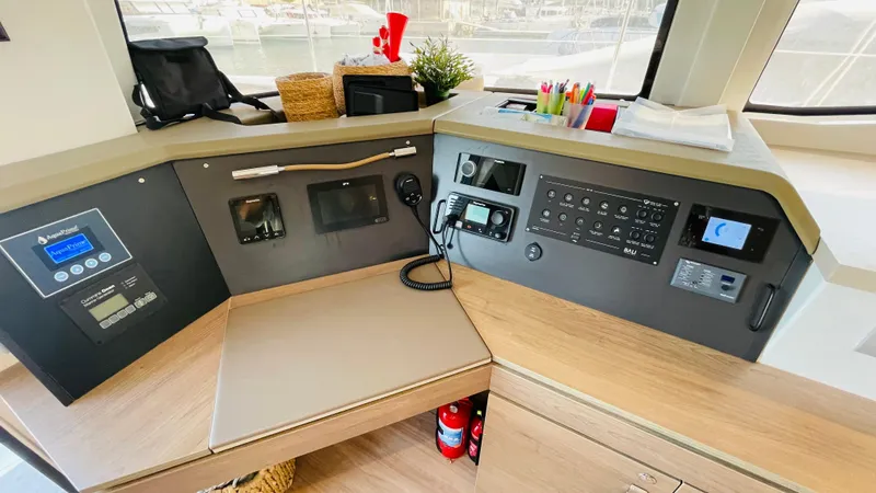  Yacht Photos Pics Control panel of a 2022 Bali 4.4 yacht, featuring navigation and communication equipment.
