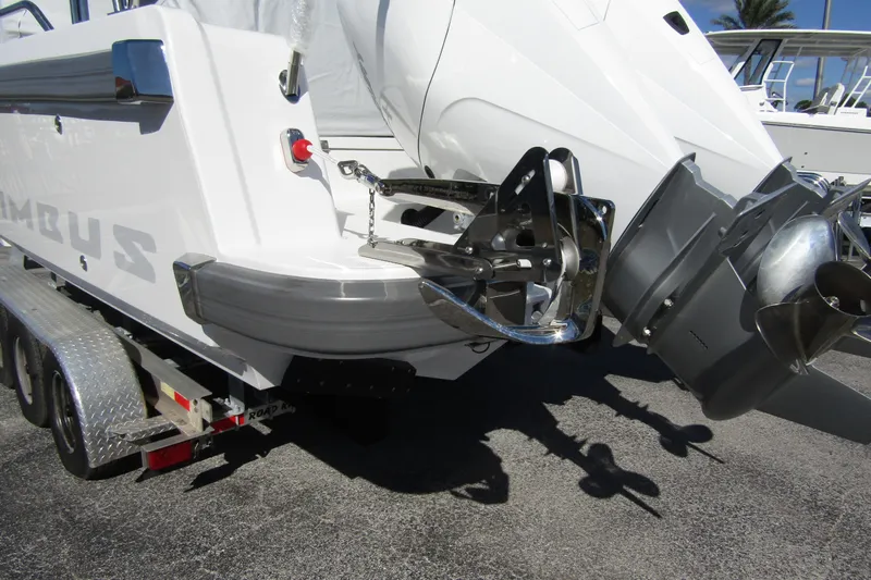  Yacht Photos Pics 2025 Nimbus Tender 9 boat on trailer, showcasing rear view and propeller details.