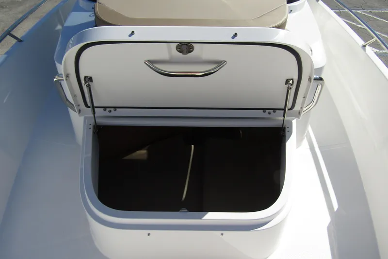  Yacht Photos Pics Open storage compartment on 2025 Nimbus Tender 9 boat, featuring sleek design and functionality.