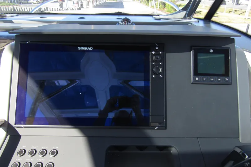  Yacht Photos Pics Control panel of 2025 Nimbus Tender 9 boat with Simrad display.