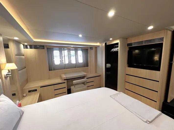  Yacht Photos Pics Luxurious cabin interior of a 2006 Princess V70 yacht with modern amenities.