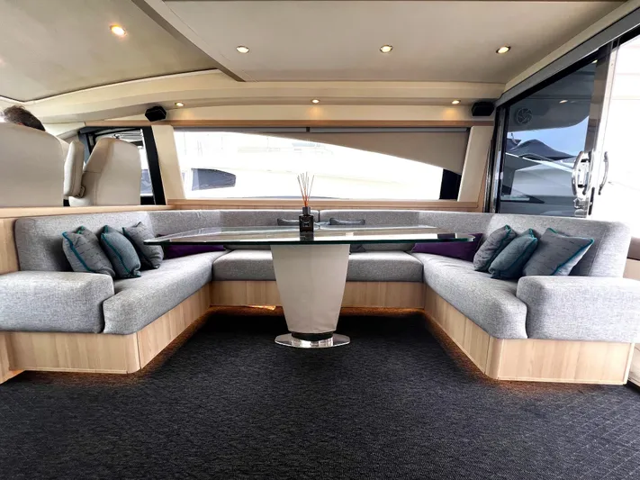  Yacht Photos Pics Luxurious interior of a 2006 Princess V70 yacht with elegant seating and modern design.