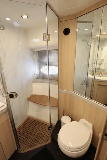  Yacht Photos Pics Luxurious bathroom in 2006 Princess V70 yacht with modern fixtures and elegant design.